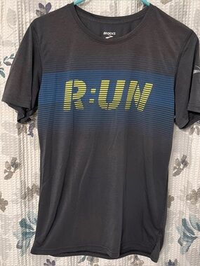 Brooks Black Short-Sleeve Running Tee with Blue Stripe and Yellow R:UN Graphic